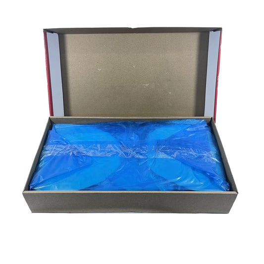 Open box with blue plastic wrap inside on a white background