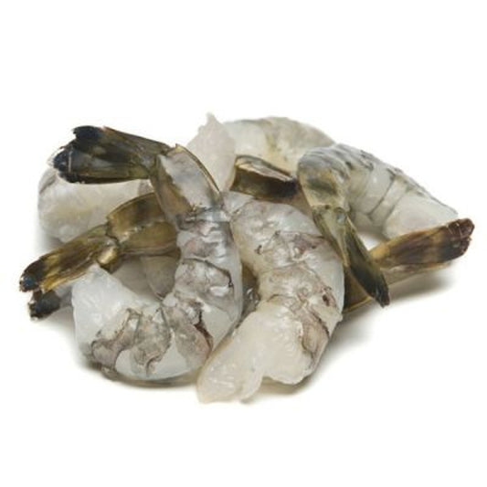 Raw prawn cutlets on a white background