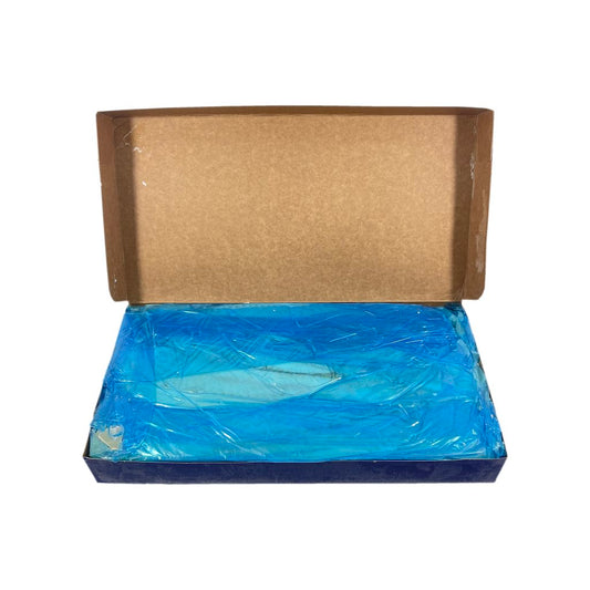 Open cardboard box with blue plastic wrapped deep sea cod fillets inside on a white background