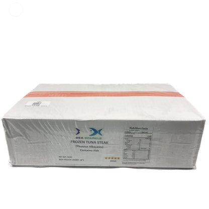 Box of Tuna Steaks on a white background