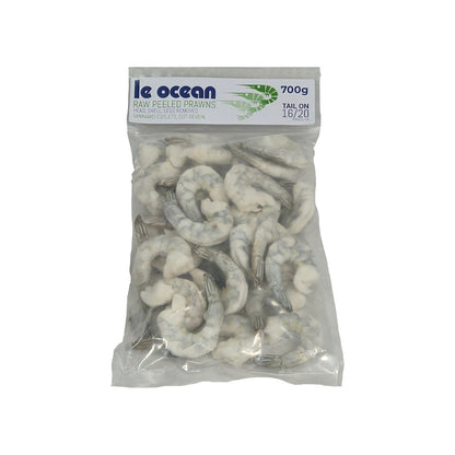 Bag of raw peeled prawns with 'Le Ocean' branding on a white background