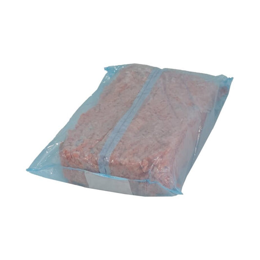 bag of diced carrots in blue clear plastic bag on white background