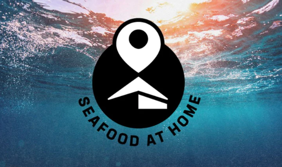 A gift card from Seafood At Home with an underwater scene and logo.