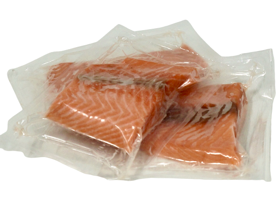 salmon portions in vacuum pack with no backgound