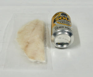 individual parrot fillet next to can of drink for reference