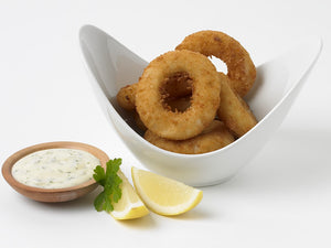 calamari rings in bowl with lemon and garnish with bowl of tartare sauce