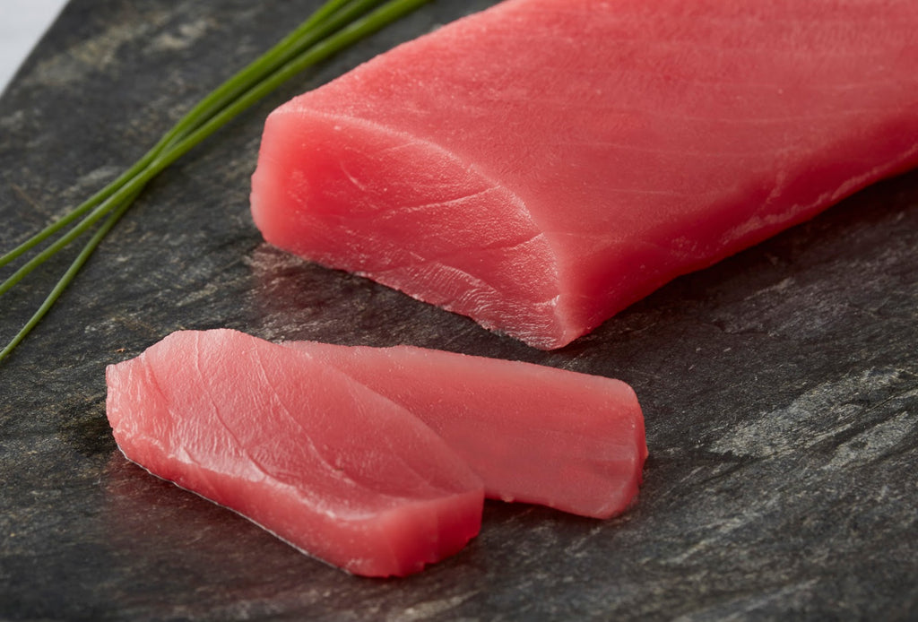 2 sliced off strips from tuna saku