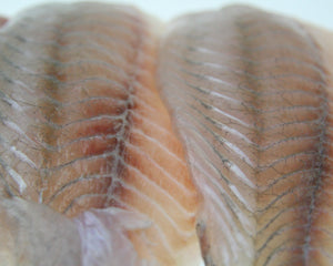close up of skin off barramundi fillets