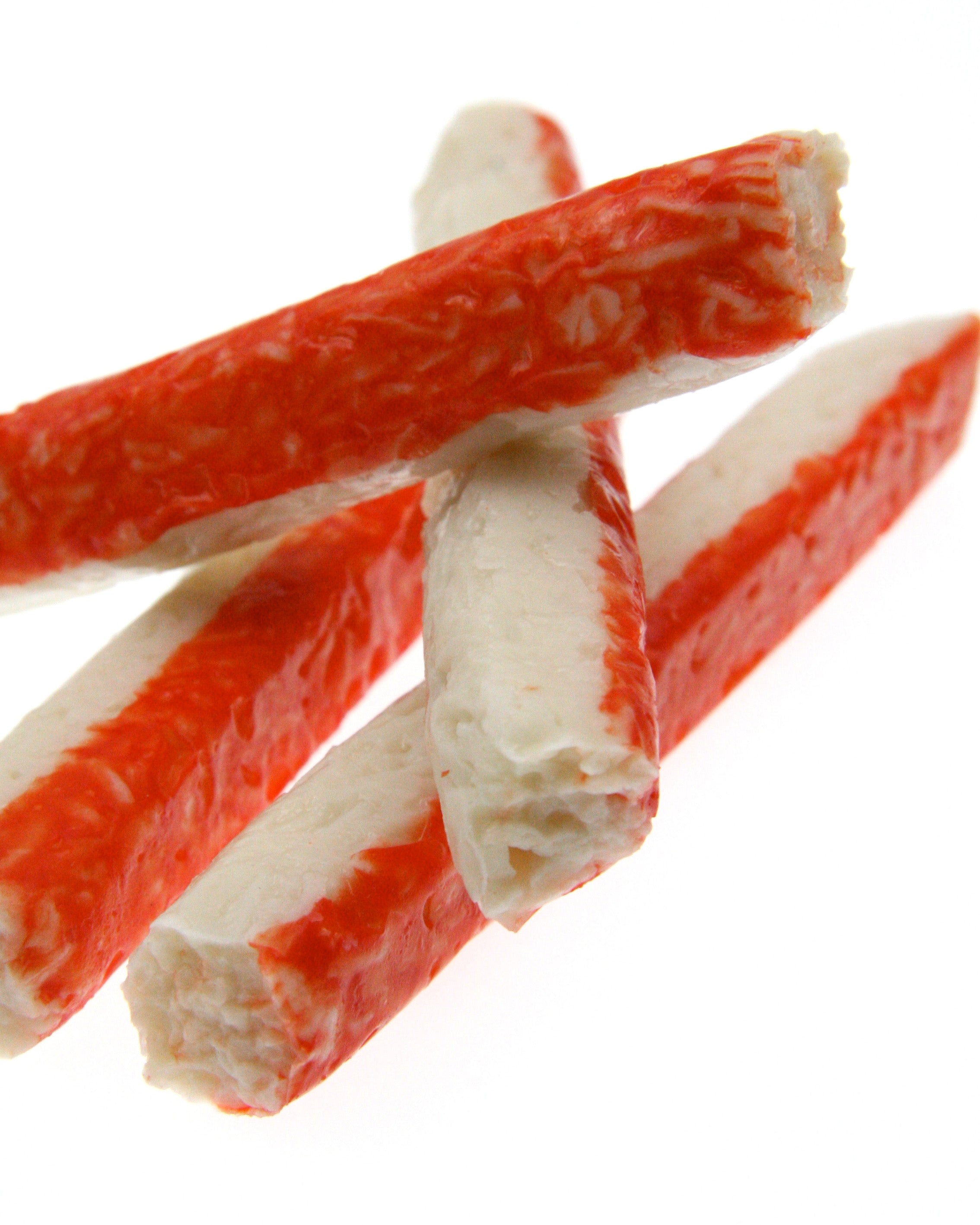 close up seafood sticks white background